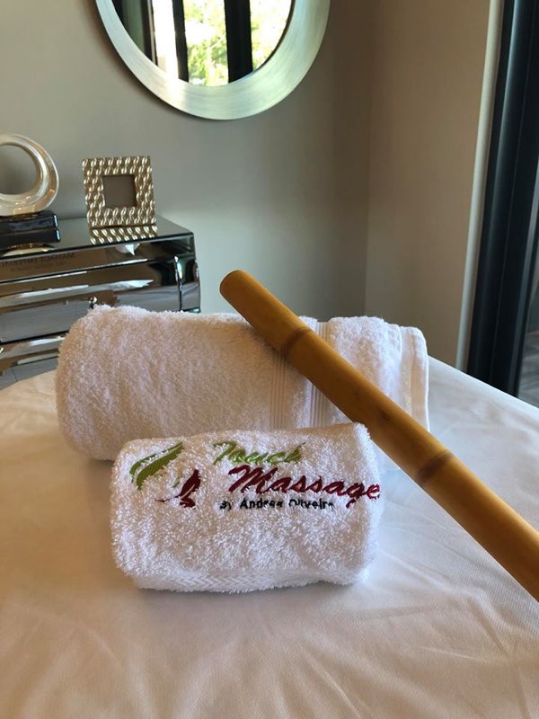 Bamboo massage tool and Touch Massage branded towels